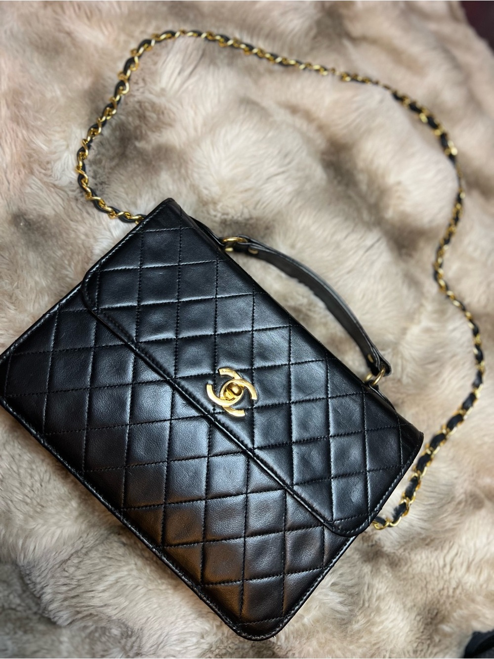 CHANEL Black Quilted Lambskin Satchel with Gold Chain and CC Turn-Lock